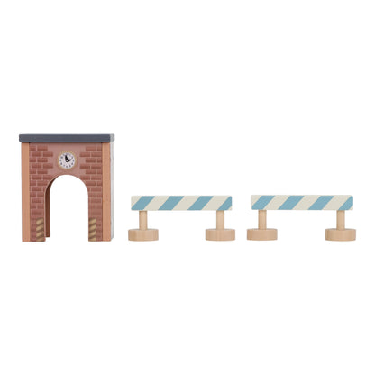 Wooden toy set with a brick arch and two striped benches on a white background